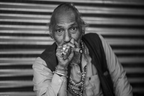 Kumbh Pilgrim Smoker Sangam, Uttar Pradesh. February 2019